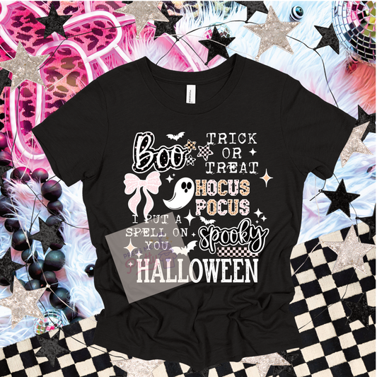 Black t-shirt with Halloween-themed text and graphics on a colorful background
