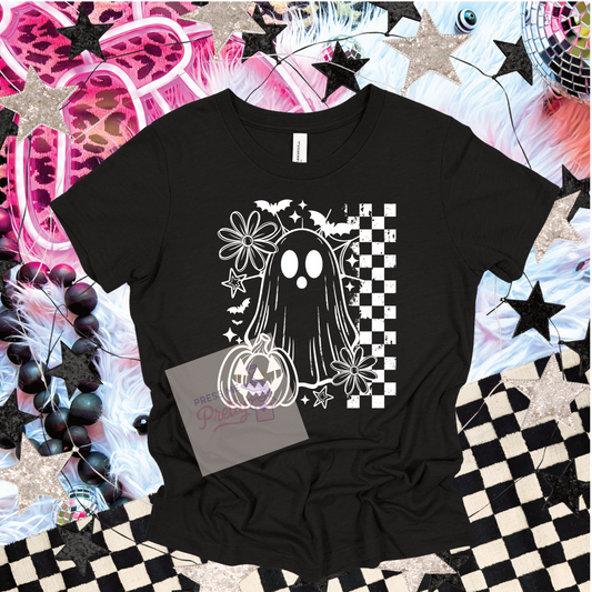 Black t-shirt with a ghost design on a colorful checkered background